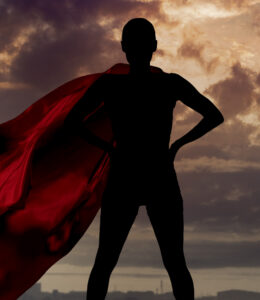 Portrait of young hero woman with super person red cape guard city By Svetlana Radayeva