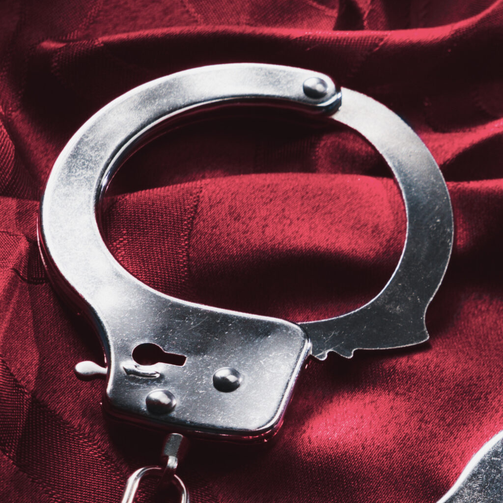 Kinky handcuffs on the bed sheets By fergregory
